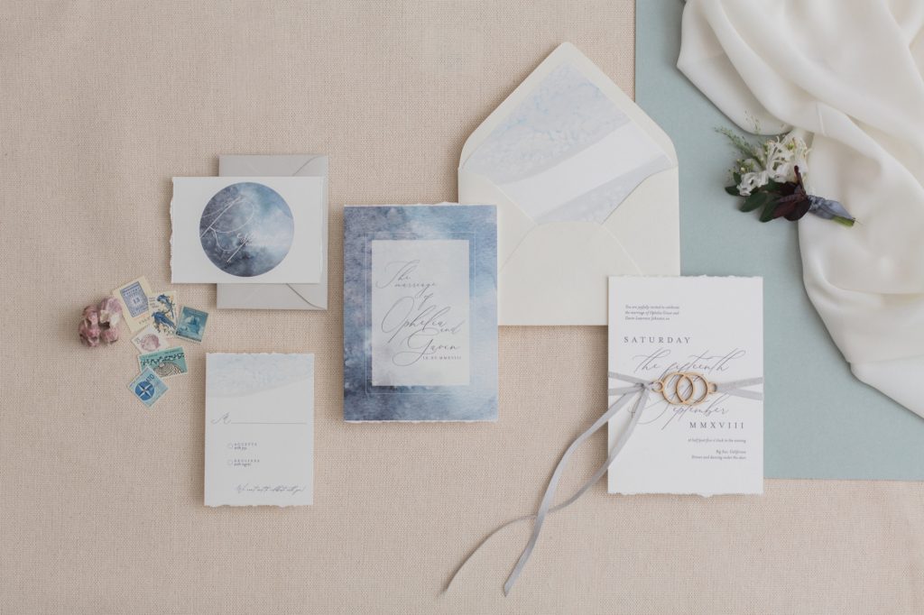 Styled shoot wedding invitation layout flatlay